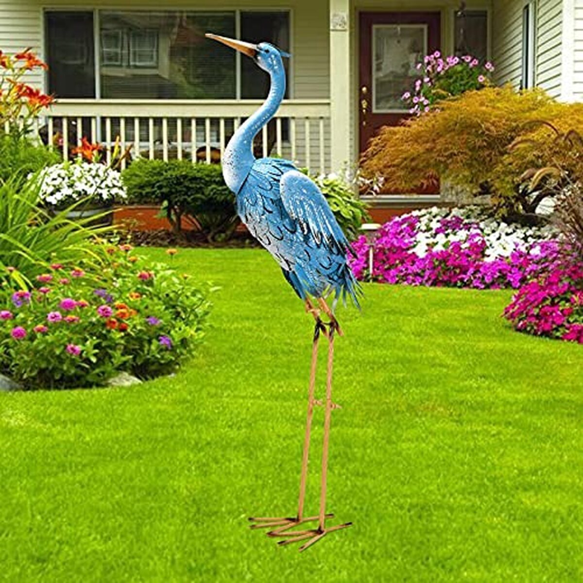 Avis sur la statue héron Nacome : élégance en métal bleu