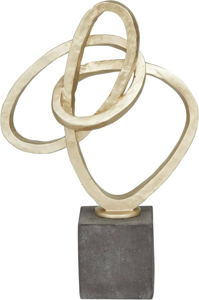 Avis sur la sculpture abstraite Deco 79 en polystone doré